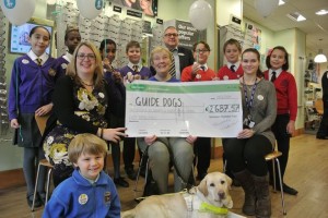 Guide dog puppy named at Wimbledon Specsavers
