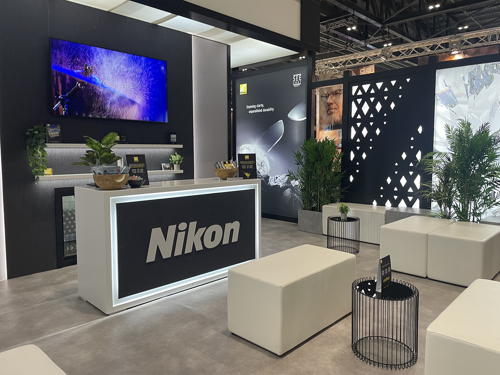 100% Optical Nikon stand