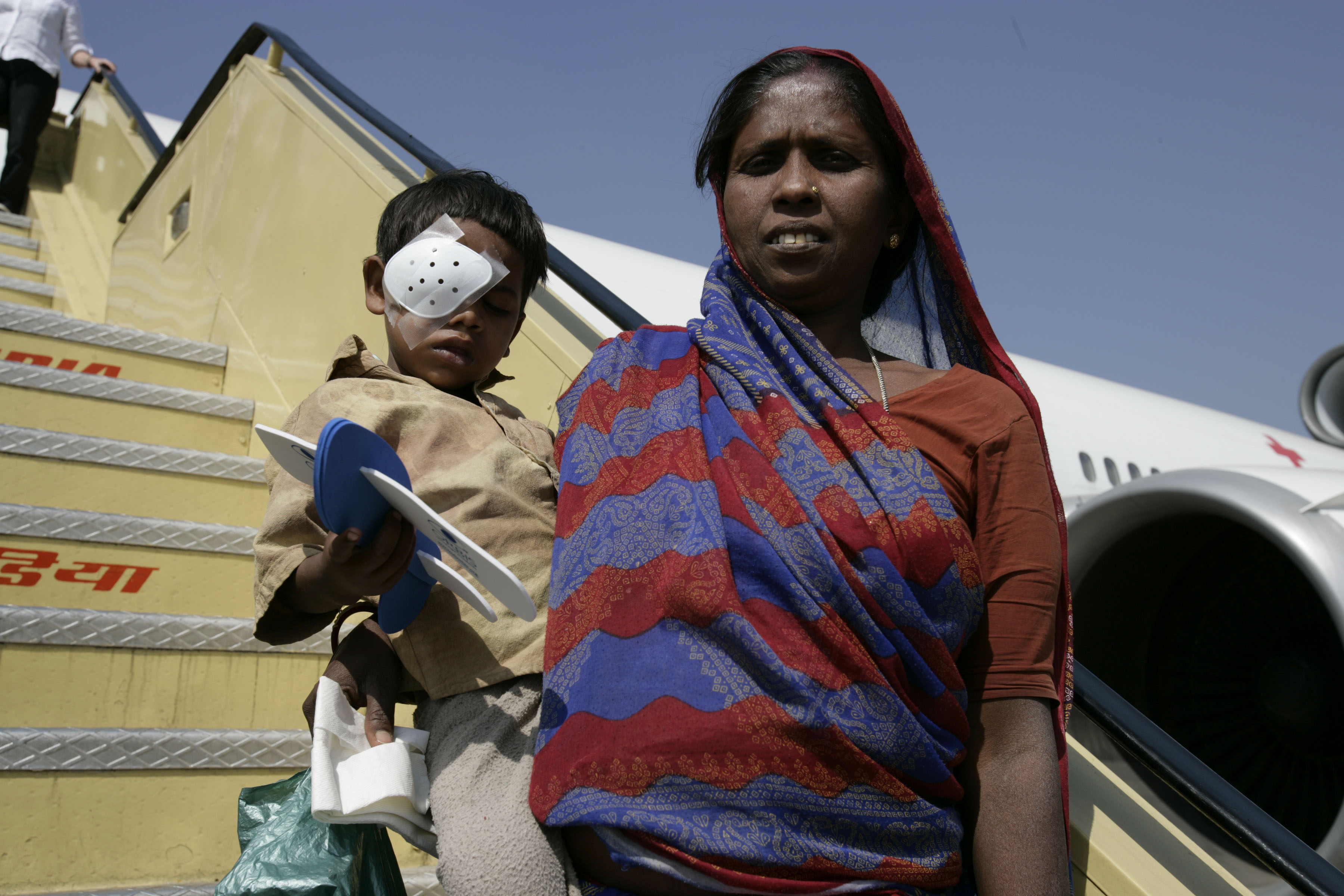 Santos and Sona Das leaving the Flying Eye Hospita