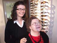 Dispensing optician Arran Taylor with her patient
